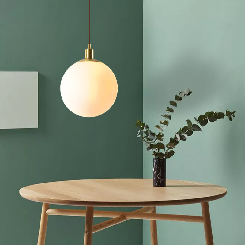 Adjustable Ceiling Pendant with Glass Shade for Entryway, Den, or Sleeping Space - Modern Suspended Fixture in White or Gold - 10 Inch Globe | Thomler