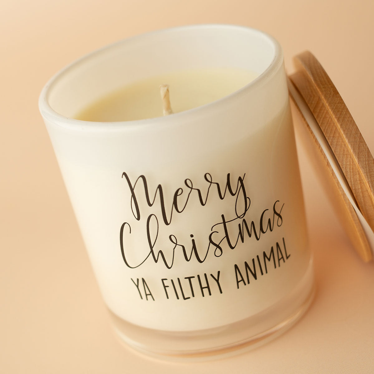 Weihnachtskerze mit Aufdruck – Filthy Animal