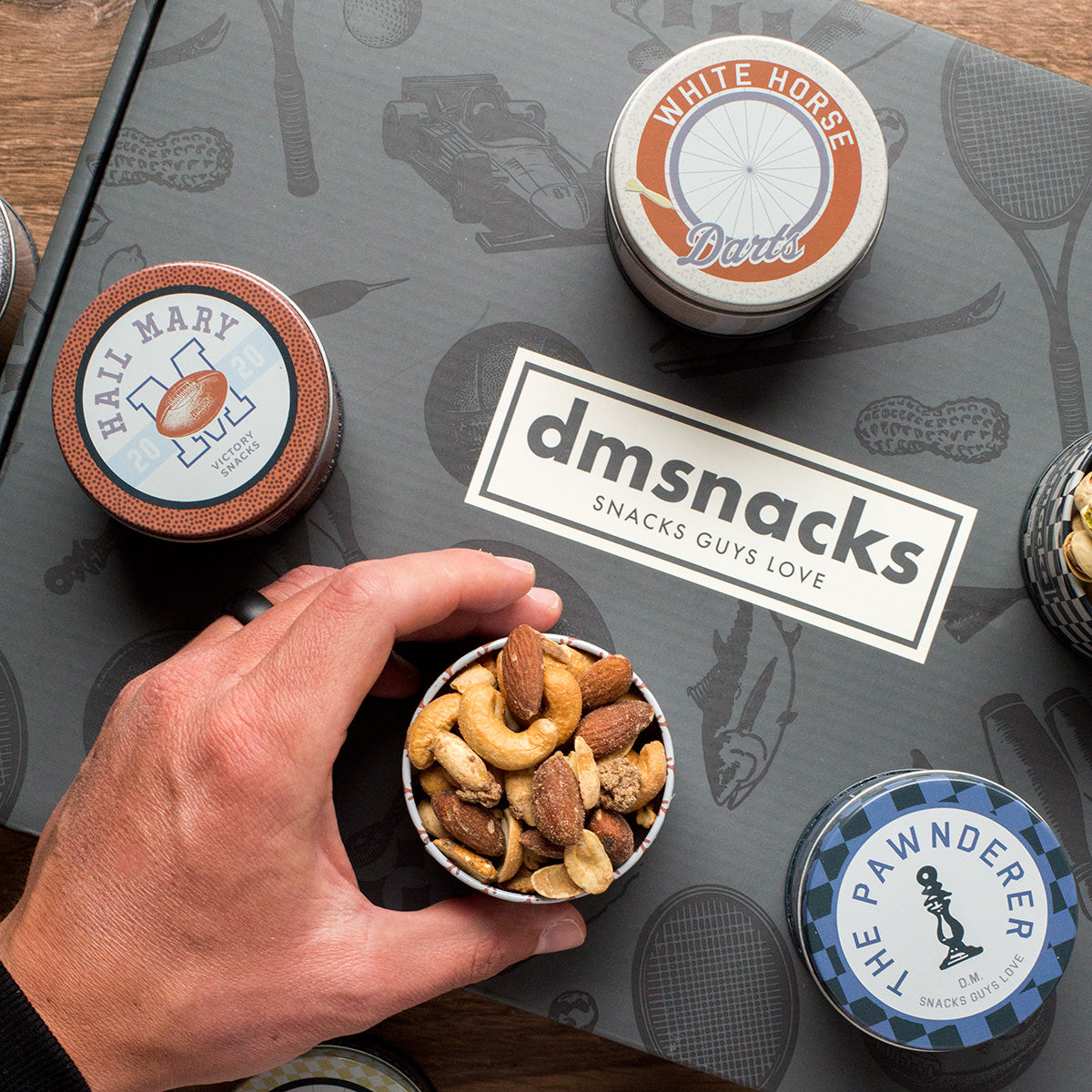 Colección de aperitivos gourmet para el carrito de bar Damn, Man