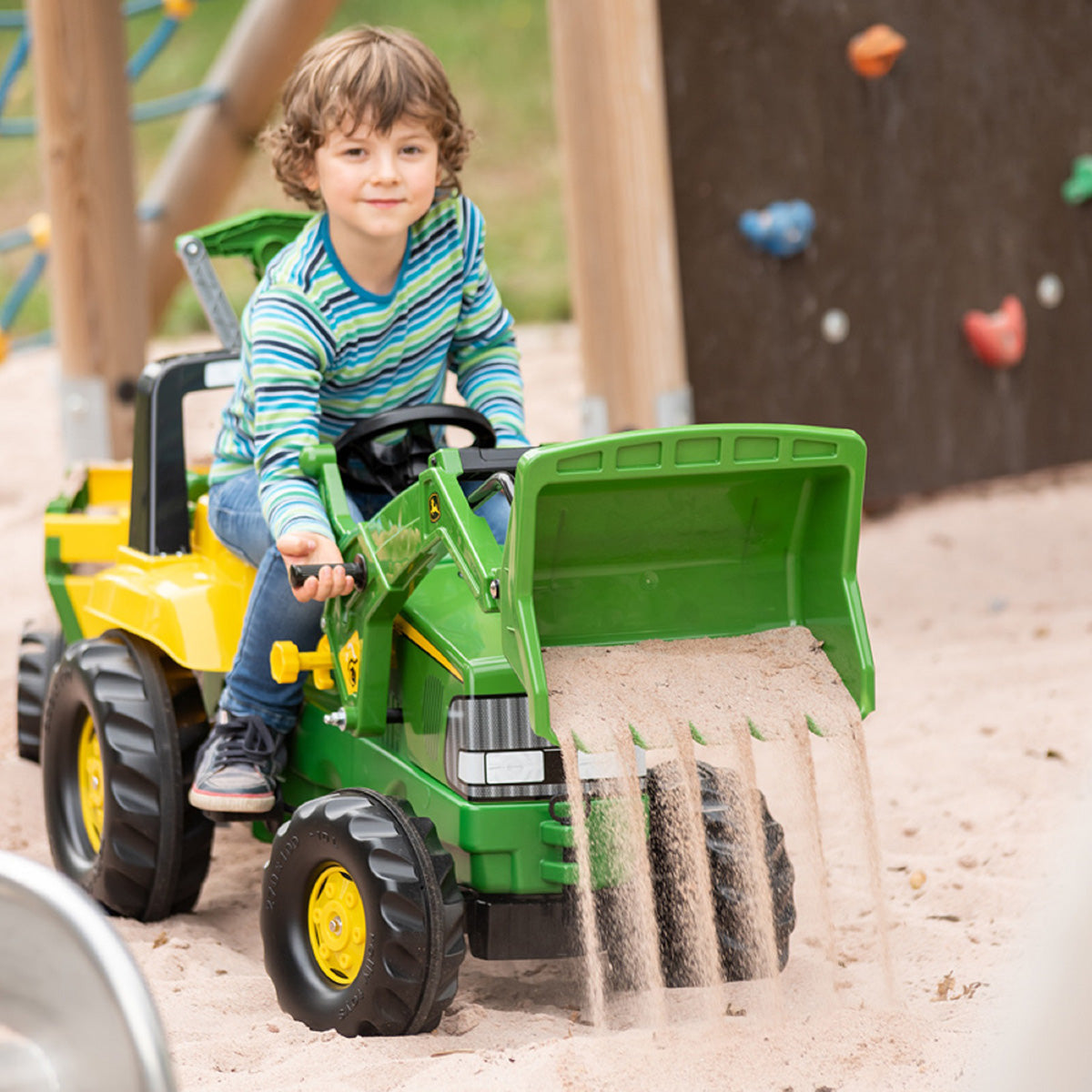 John Deere Tret-Radlader mit Heckbagger