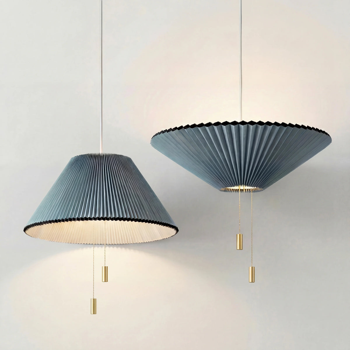 Sculptural Paper Shade Hanging Fixture with Transformable Geometry for Overhead Illumination Above Tables Islands Counters Light Blue Warm G | Thomler