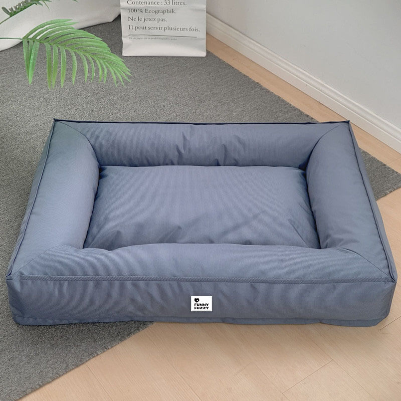 Cama para perro con bordes elevados, espuma para alivio articular y funda impermeable para razas grandes