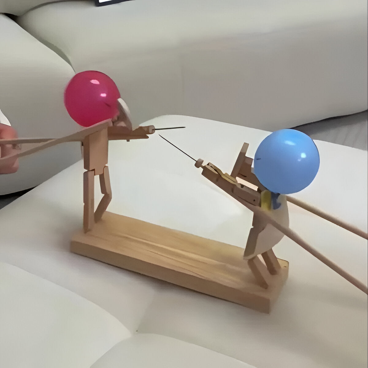 Houten schermpoppenspel