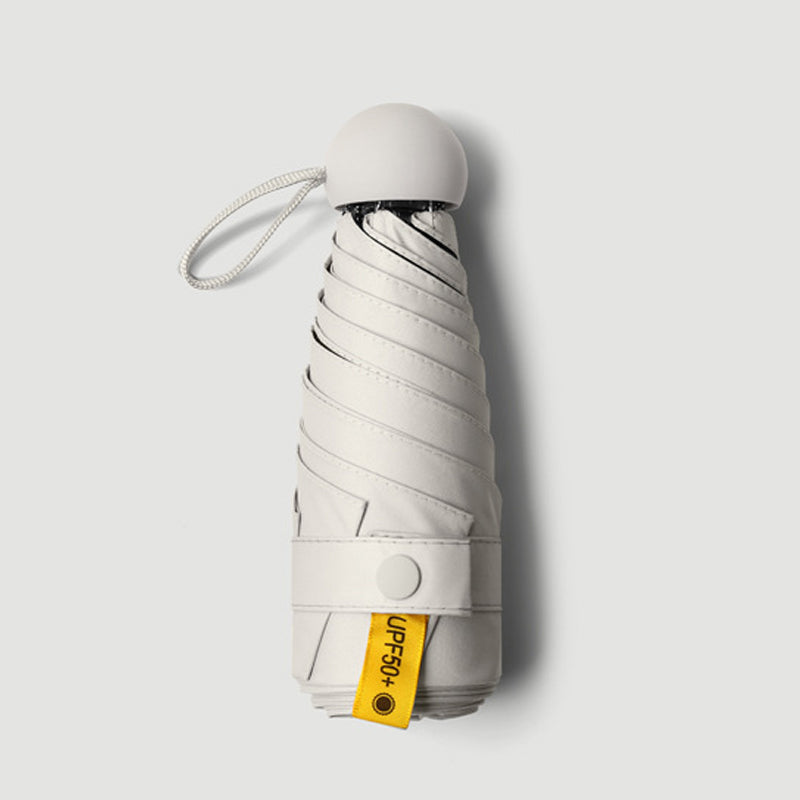 Compact Mini Umbrella with UPF 50+ Sun Protection & Wind-Resistant Frame for Travel & Everyday Carry