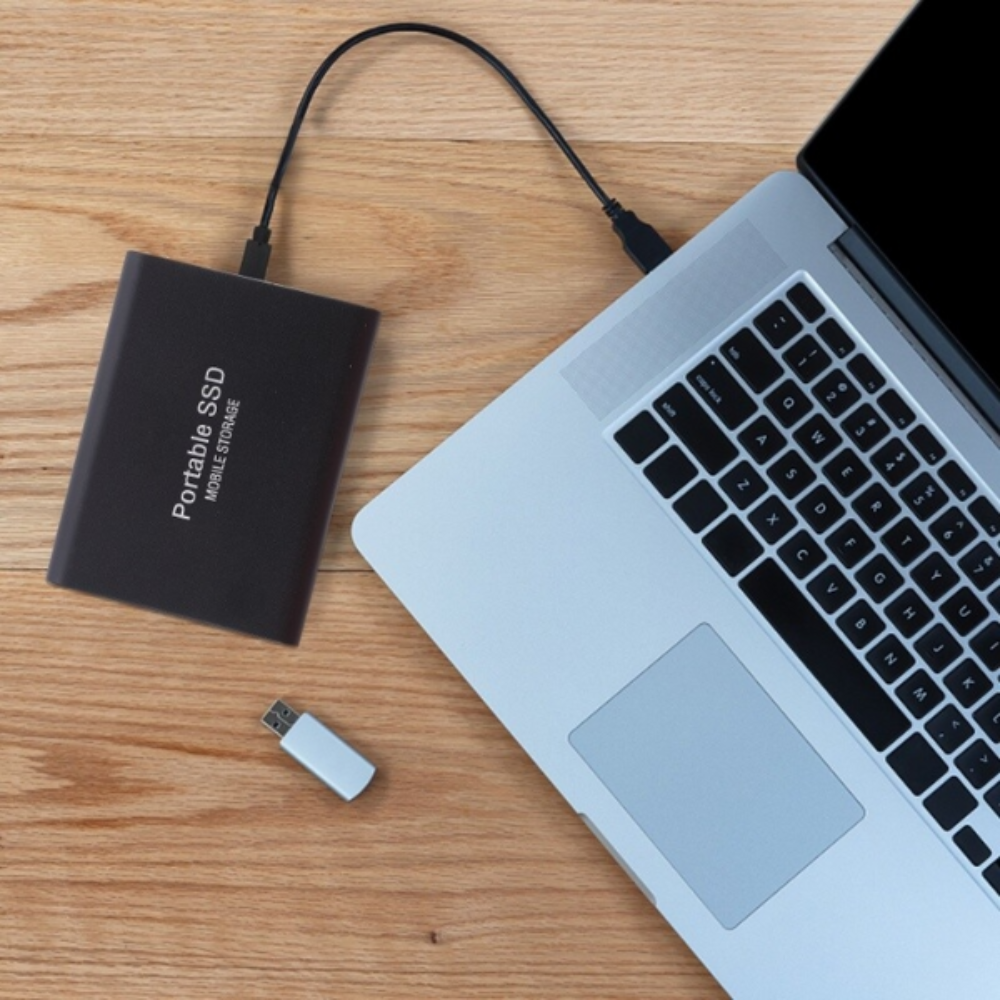 SSD portátil USB, velocidad de lectura de 1050 MB/s, capacidad de almacenamiento de 1 TB, carcasa resistente a impactos para Mac, Windows, Android, juegos y copias de seguridad | Thomler
