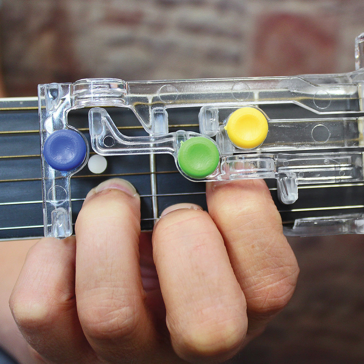 ChordBuddy gitaar-leersysteem