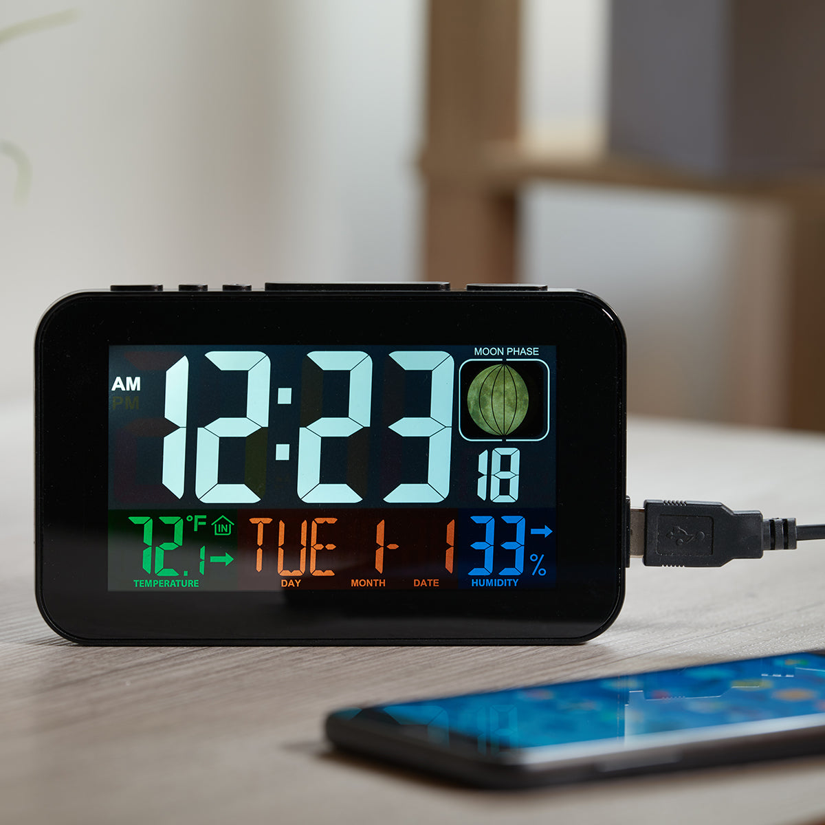Reloj despertador atómico con carga para teléfono