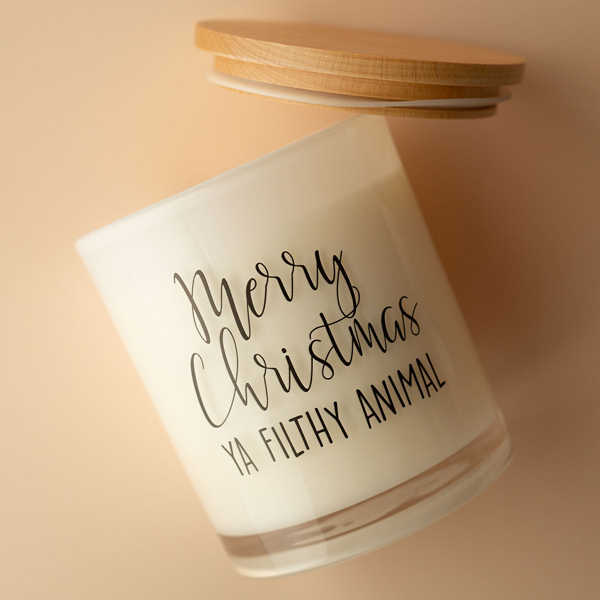 Weihnachtskerze mit Aufdruck – Filthy Animal