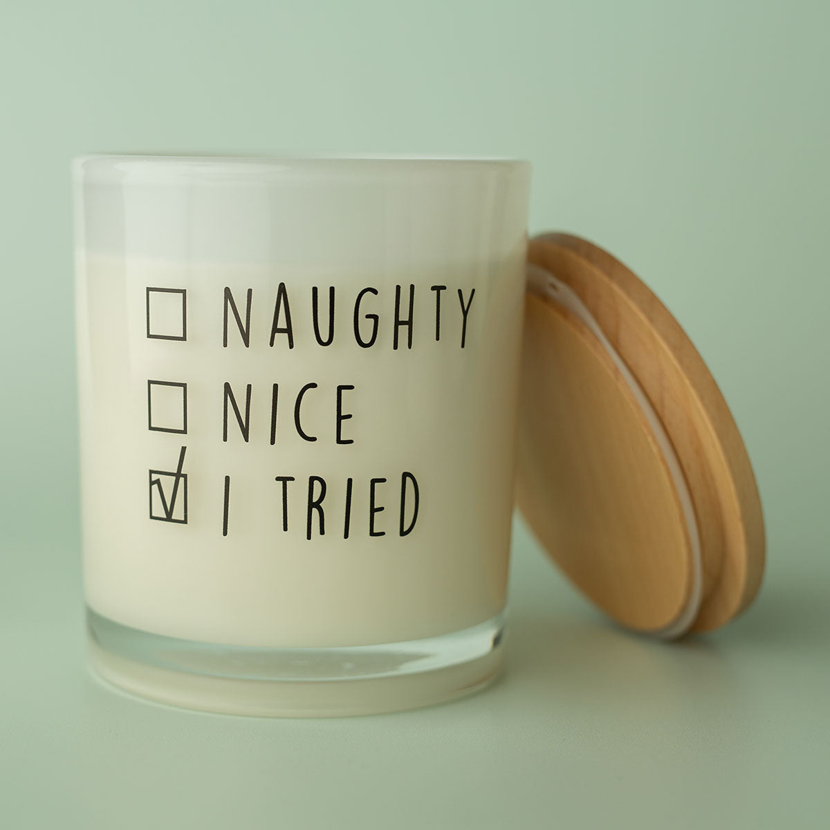 Weihnachtskerze mit Aufdruck - Naughty Nice