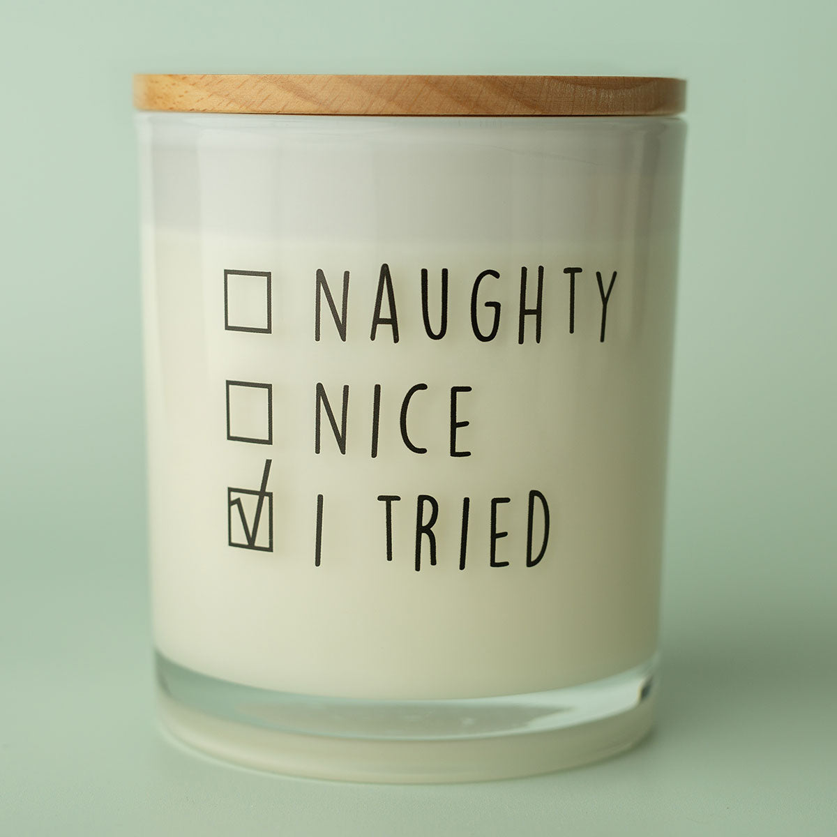 Weihnachtskerze mit Aufdruck - Naughty Nice