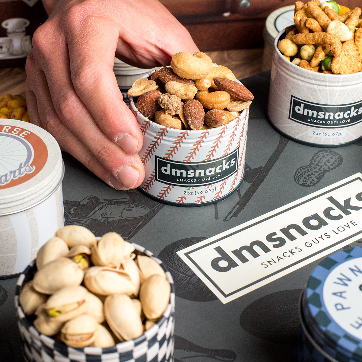 Colección de aperitivos gourmet para el carrito de bar Damn, Man