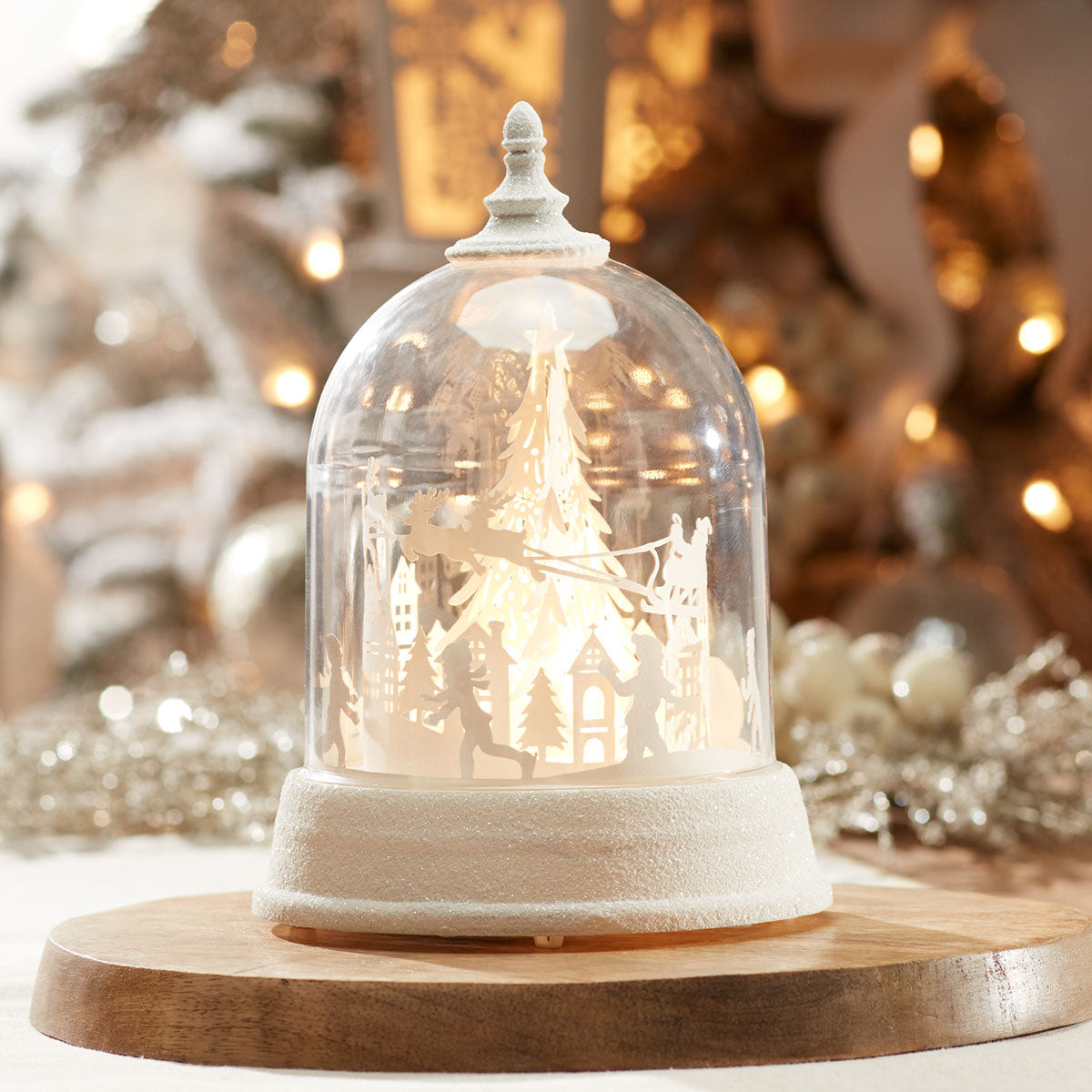 LED-draaisneeuwbol met kerstman in slee