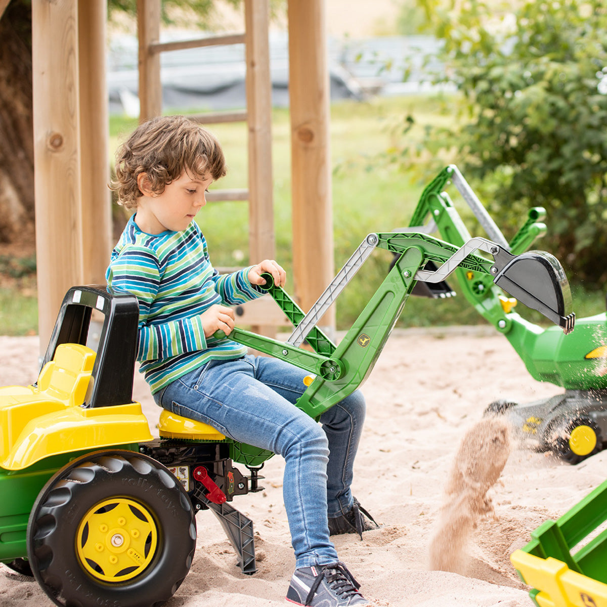John Deere Tret-Radlader mit Heckbagger