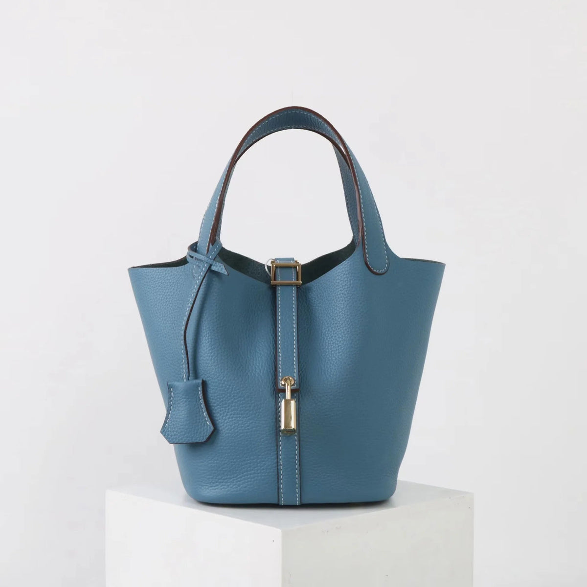 Bolso bombonera de piel color topo de lujo