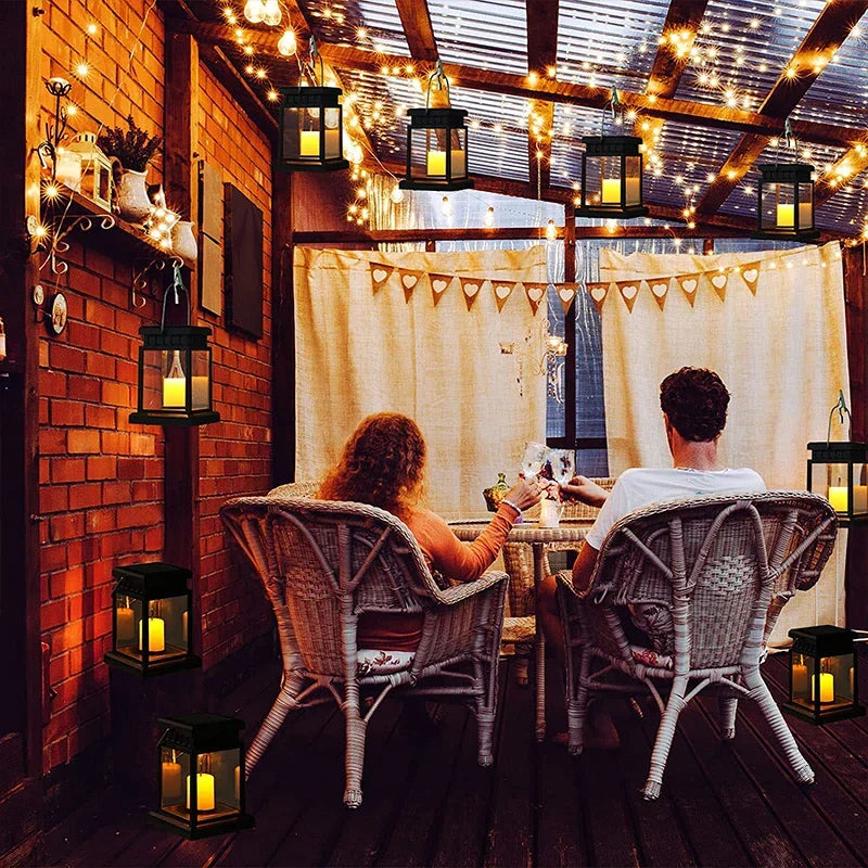 Hangende buitenlamp met flikkerende led en autosensor, decoratief accent op zonne-energie voor terras, tuin en looppad, weerbestendige ABS-constructie | Thomler