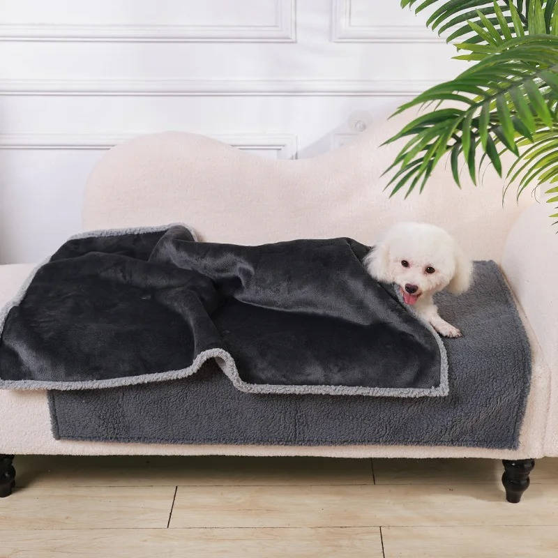 Manta impermeable para perros con forro de sherpa y diseño de borde elevado