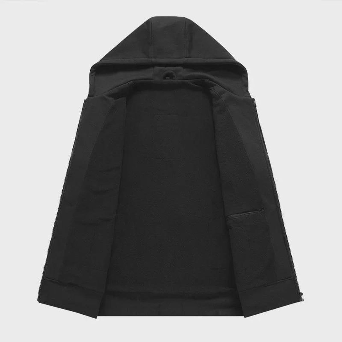 Sudadera con cremallera y calefacción integrada que te mantiene caliente sin añadir volumen