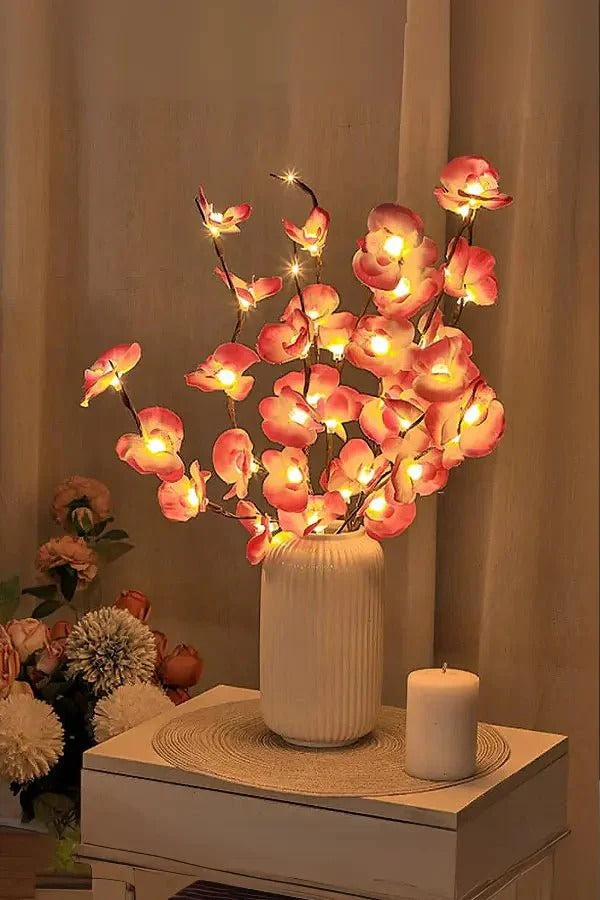 Verlichte betoverende tak met ledverlichting