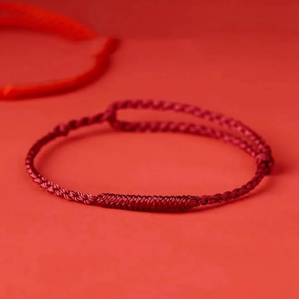 Handgeweven rode draadarmband met heilige kralen voor geluk en spirituele bescherming | Verstelbare koordarmband met zegen voor heren en dames | Thomler