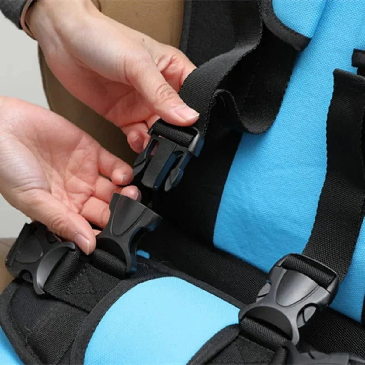 Asiento de seguridad portátil para niños