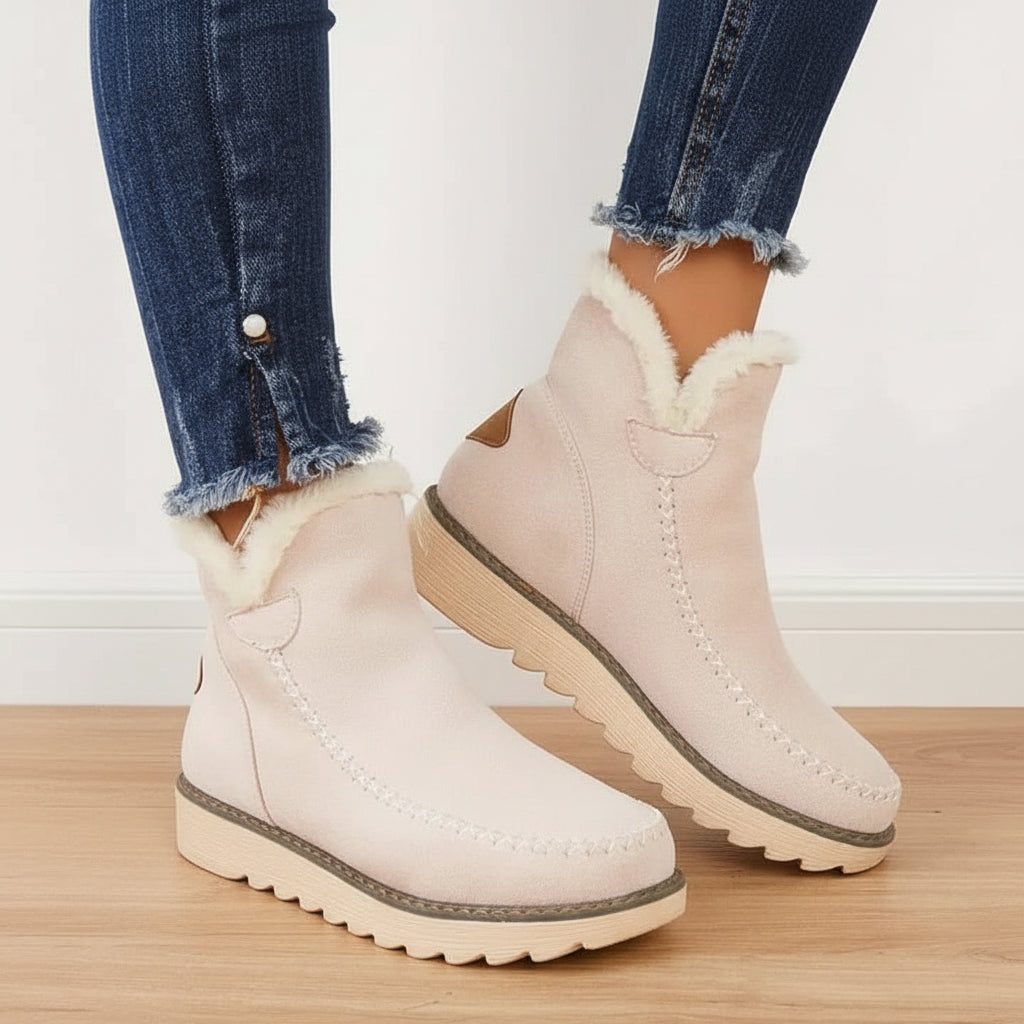 Damen-Schlupf-Stiefeletten mit Fellfutter und flacher Sohle