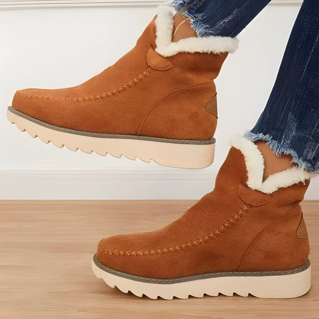 Damen-Schlupf-Stiefeletten mit Fellfutter und flacher Sohle