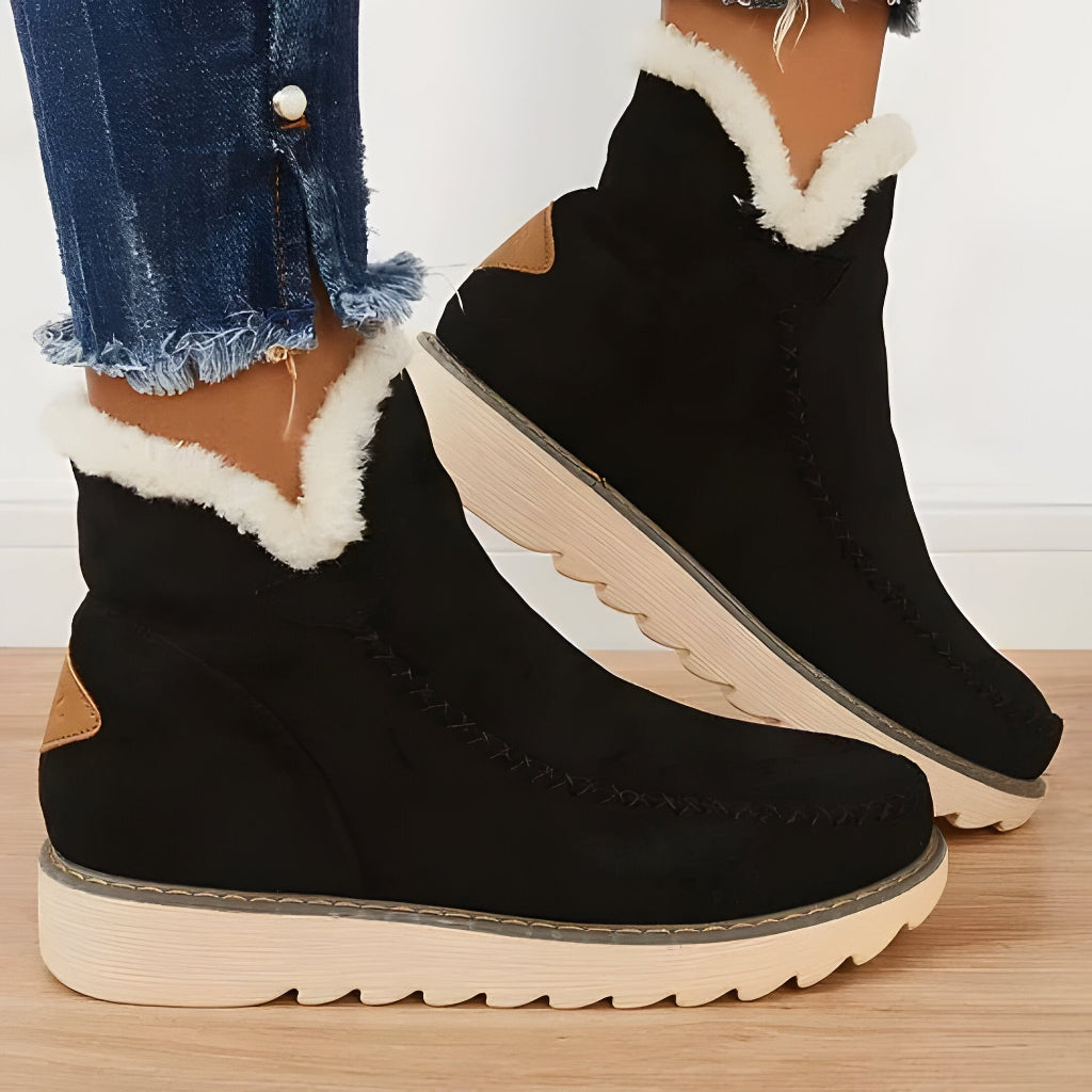 Damen-Schlupf-Stiefeletten mit Fellfutter und flacher Sohle