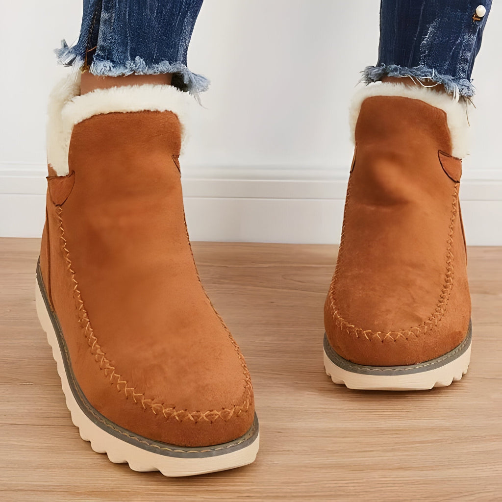 Damen-Schlupf-Stiefeletten mit Fellfutter und flacher Sohle